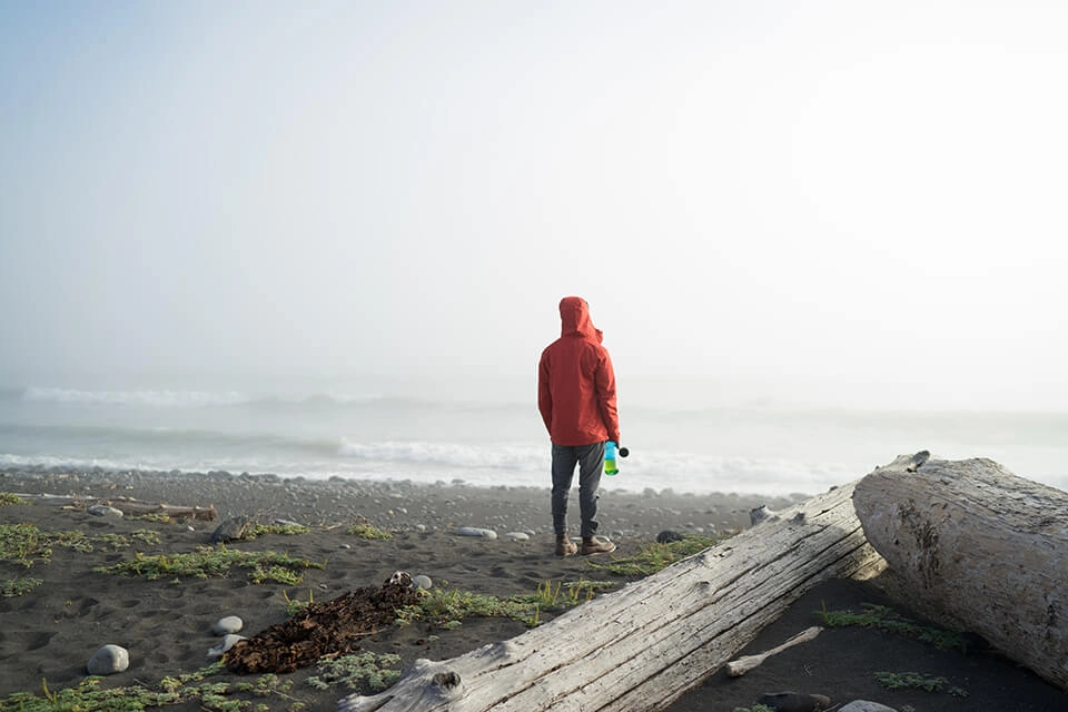 Man standing alone on the beach