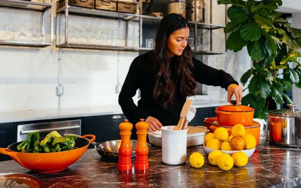 Woman cooking healthy meals in the kitchen