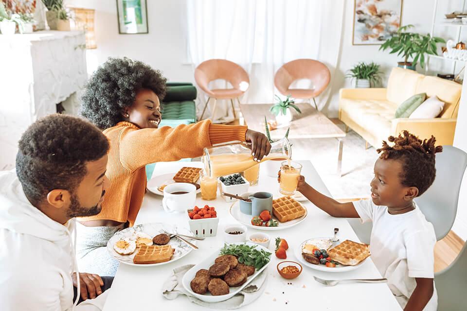 A family eating breakfast together