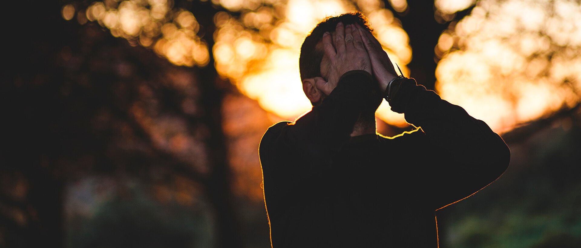 a person with their hands in the air.