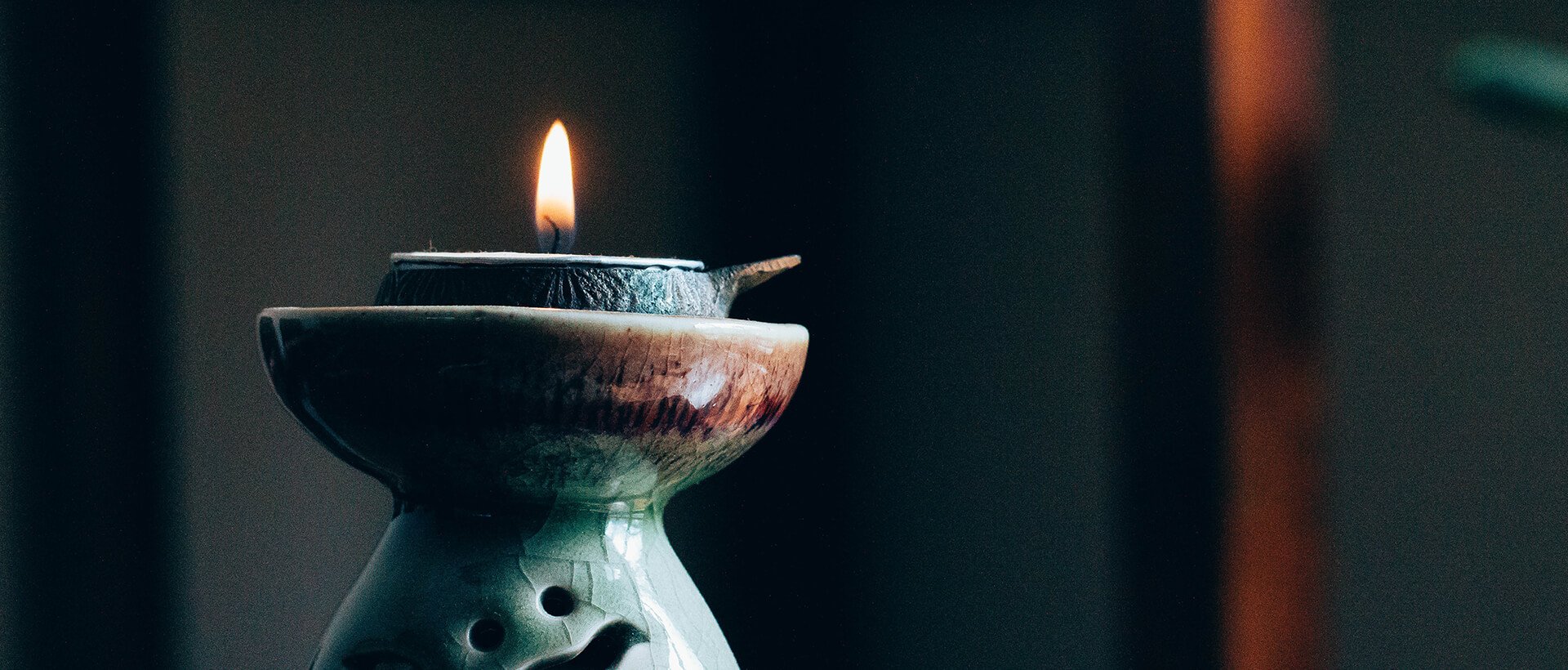 a candle that is sitting on a table.